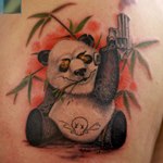 Панда с револьвером